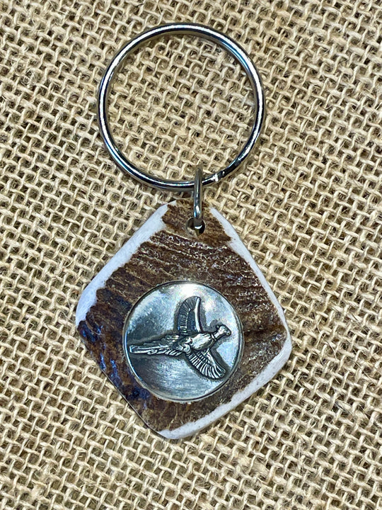 Handcrafted antler key chains featuring a variety of inlays. Made from naturally shed elk and deer antlers. Made in the U.S.A. Get yours at our Smyrna, TN shop not far from Franklin.