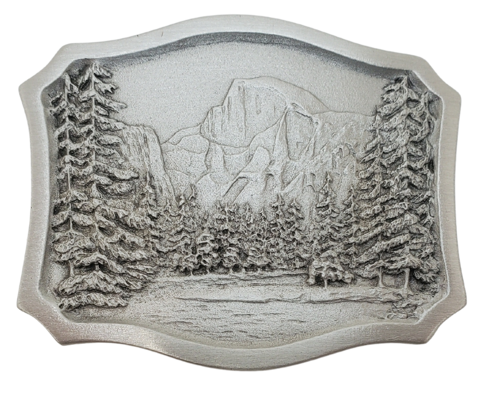 Shield shaped antique silver colored belt buckle with the well known Yosemite National Park scene with a 70's vibe.&nbsp;&nbsp;Available online and at our shop just outside Nashville in Smyrna, TN.