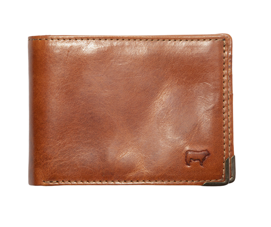 A traditional billfold with an internal antique brass money clip to secure cash. Includes three card slots and a mesh ID slot with an additional pocket underneath. Bottom right corners are reinforced by antique brass. Compact 4.25” x 1” x 3.5” made Certified Full Grain Italian Veg-Tan Leather, arguably the best in the world. Find yours at our Smyrna, TN close to Franklin. Made by Will Leather.