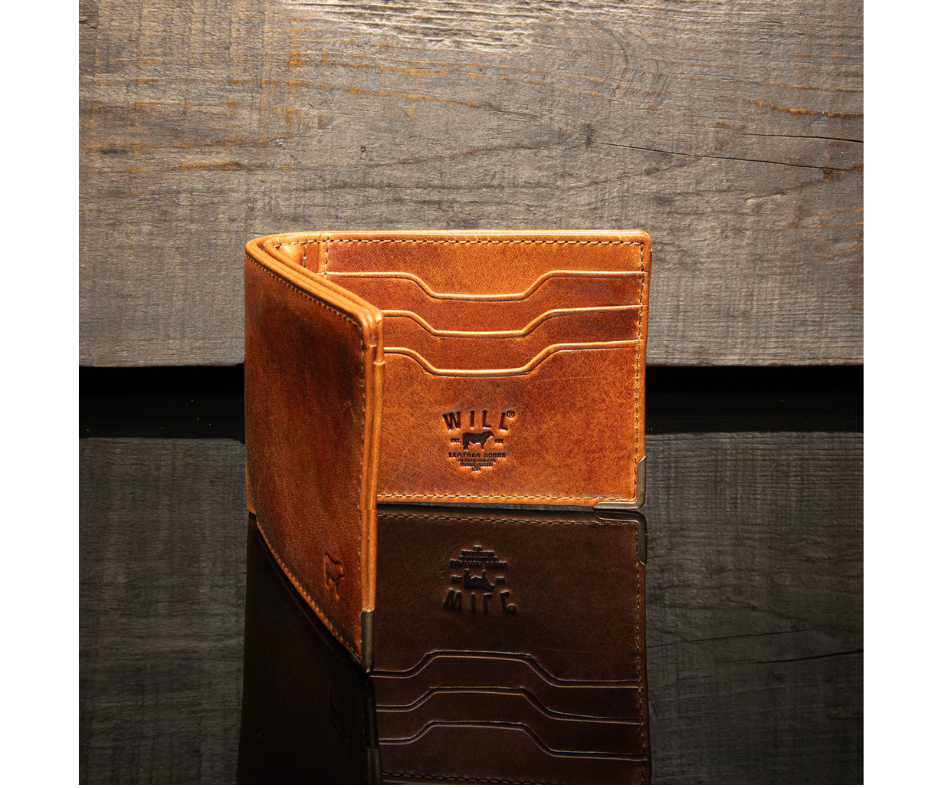 A traditional billfold with an internal antique brass money clip to secure cash. Includes three card slots and a mesh ID slot with an additional pocket underneath. Bottom right corners are reinforced by antique brass. Compact 4.25” x 1” x 3.5” made Certified Full Grain Italian Veg-Tan Leather, arguably the best in the world. Find yours at our Smyrna, TN close to Franklin. Made by Will Leather.
