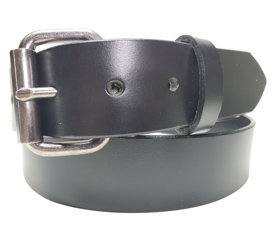 Bring that rugged, hardworking vibe to your cubicle with The Industrialist Leather Belt! Rock a beefy Antique Roller buckle that laughs in the face of your daily paper-pushing adventures. At 1 1/2" wide in either sleek Black or character-rich Distressed Brown, this belt plays nice with jeans or casual pants. Feeling fickle? Swap buckles faster than you can say "casual Friday" thanks to our snap system. Mosey on down to our Smyrna, TN shop and saddle up with your new favorite belt!