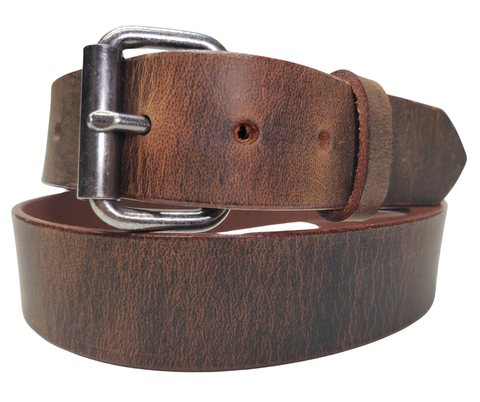 Bring that rugged, hardworking vibe to your cubicle with The Industrialist Leather Belt! Rock a beefy Antique Roller buckle that laughs in the face of your daily paper-pushing adventures. At 1 1/2" wide in either sleek Black or character-rich Distressed Brown, this belt plays nice with jeans or casual pants. Feeling fickle? Swap buckles faster than you can say "casual Friday" thanks to our snap system. Mosey on down to our Smyrna, TN shop and saddle up with your new favorite belt!