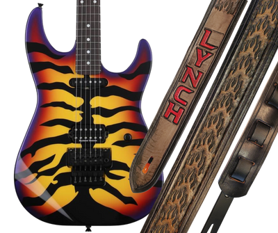 Mr. Lynch is a Icon in shredding guitar world. Lighting fast riffs and licks is why we chose Fire for this strap. The main strap is made from a single strip of Veg tan leather with beveled and painted edges with a embossed Fire pattern.  Choose a 2" or 2 1/2" wide strap with a classic adjustment style. Made just outside Nashville in Smyrna, TN.