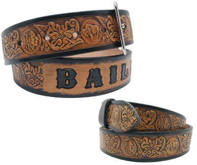 This unique Name Belt features a hand-stained strip of vegetable tanned leather, displaying a Western Scroll design and both sides of the iconic Buffalo Nickel pattern. The antique nickel finish solid brass buckle can be easily changed. Handcrafted in our Smyrna, Tennessee shop, near Nashville.