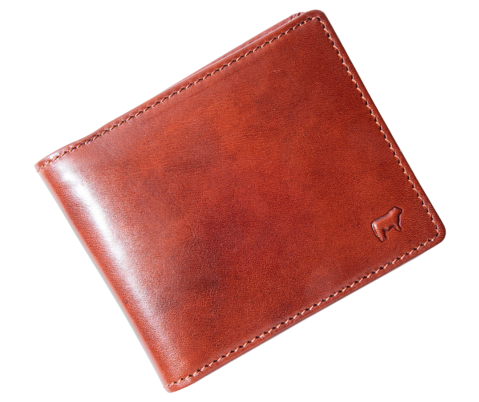 Italian Full Grain Veg-Tan is some of the finest leather in the world. Yes it cost more but when you want the best your willing to pay a bit more. Smooth and soft Italian calfskin with a glossy finish in Brandy and Cognac. 5 card slots, I.D. slot, 2 cash pockets. It's compact 3" x 4" x .75" size is right size for your daily needs. Now stocked at our Smyrna, TN store not far from Famous Franklin. Made by Will Leather, Imported.