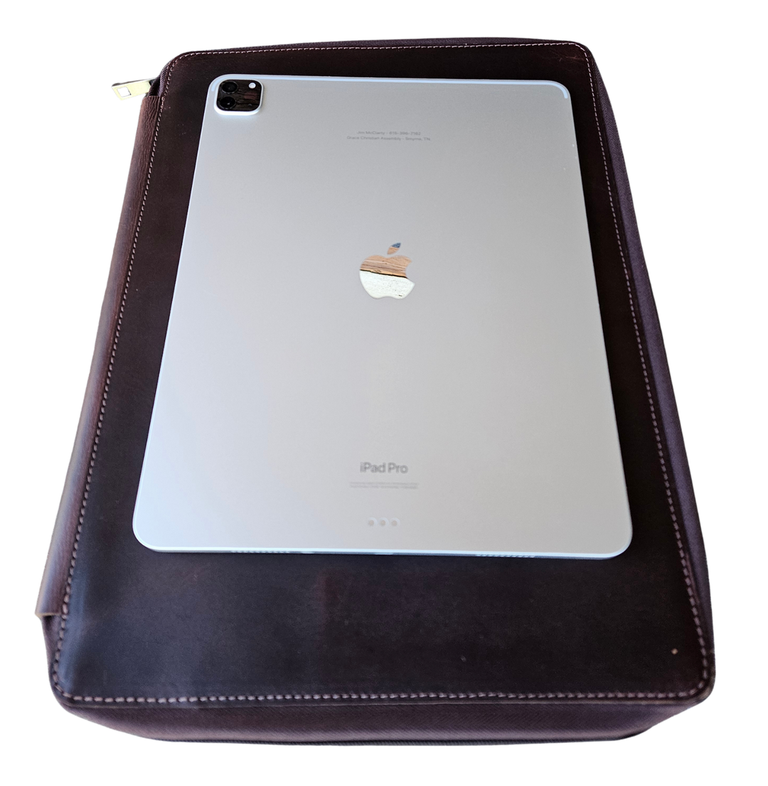 Stay organized with our Hudson Leather MacBook Portfolio. Being crafted from top-grain buffalo leather that develops character over time. Designed to fit a 13” MacBook or tablet, this portfolio features a dedicated laptop sleeve, phone sleeve, power bank slot, and five pen holders, ensuring all your essentials are neatly stored. Whether for work or on the go, this portfolio is a timeless blend of elegance and efficiency. Part of our Home and Office leathers at our Smyrna, TN shop.