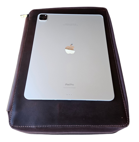 Stay organized with our Hudson Leather MacBook Portfolio. Being crafted from top-grain buffalo leather that develops character over time. Designed to fit a 13” MacBook or tablet, this portfolio features a dedicated laptop sleeve, phone sleeve, power bank slot, and five pen holders, ensuring all your essentials are neatly stored. Whether for work or on the go, this portfolio is a timeless blend of elegance and efficiency. Part of our Home and Office leathers at our Smyrna, TN shop.