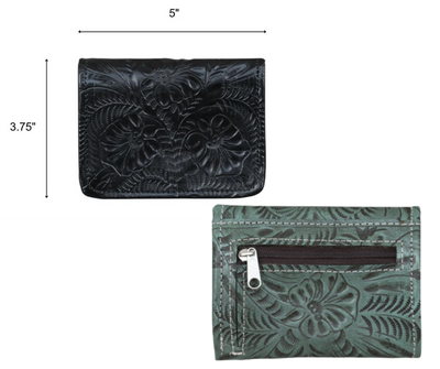 Indulge with this full grain leather tri-fold wallet! Every detail is hand-stained and hand-tooled in a western floral pattern, with a snap closure and a back zippered pocket for extra coins. Open it up to reveal 8 card slots, plus 3 other card-sized compartments, a clear ID slot, and two cash compartments. The pockets are lined with a light cotton linen to keep it slim. Swing by our Smyrna, TN shop (just off I24 from Nashville) to get yours today!