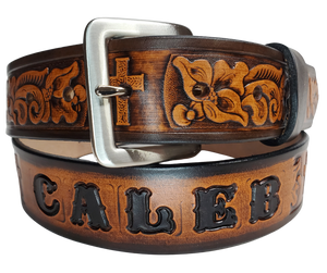 Named after the well known Bible verse...Choose this day whom you will serve! Experience a western-inspired flair with the "Joshua 24:15" Name Leather Belt. Featuring a striking floral pattern and Cross running along its length, you can even customize the name with up to 10 letters. Crafted from 1/8" thick leather and 1 1/2" wide, its Antiqued Solid Buckle Silver is attached with two snaps for an easy change. Take the next step and order yours online or visit our shop in Smyrna, TN, near Nashville.