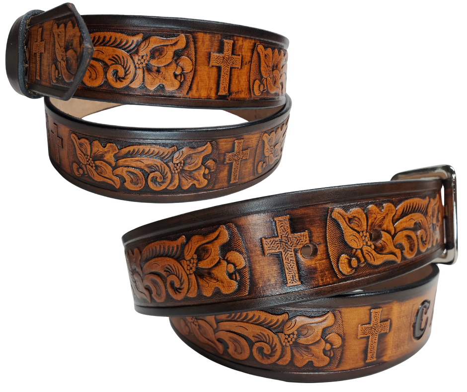 Named after the well known Bible verse...Choose this day whom you will serve! Experience a western-inspired flair with the "Joshua 24:15" Name Leather Belt. Featuring a striking floral pattern and Cross running along its length, you can even customize the name with up to 10 letters. Crafted from 1/8" thick leather and 1 1/2" wide, its Antiqued Solid Buckle Silver is attached with two snaps for an easy change. Take the next step and order yours online or visit our shop in Smyrna, TN, near Nashville.
