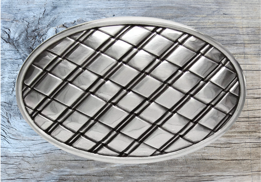 From side to side and back again, this unique oval buckle features a Kriss Kross pattern that will complement any style. Perfect for belts up to 1 1/2 inches, its playful design will Kross elevate all of your outfits. Visit our store in Smyrna, TN, just a hop skip and jump from downtown Nashville!

Approx. 3" x 4"
Imported