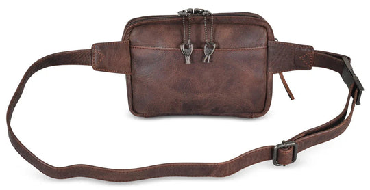 The Kailey Fanny/Sling Conceal Purse is crafted with genuine buffalo leather. This is just not your average fanny pack. The bag is highlighted with beautiful crisscross lacing or decorative studs. Unzip the front flap for easy access to your weapon. Additional storage is provided by a slip pocket on the back and a decorative zippered pocket on the front. Can be worn around the waist or as a sling. Part of our leather conceal handbags at our Smyrna, TN shop.