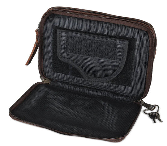 The Kailey Fanny/Sling Conceal Purse is crafted with genuine buffalo leather. This is just not your average fanny pack. The bag is highlighted with beautiful crisscross lacing or decorative studs. Unzip the front flap for easy access to your weapon. Additional storage is provided by a slip pocket on the back and a decorative zippered pocket on the front. Can be worn around the waist or as a sling. Part of our leather conceal handbags at our Smyrna, TN shop.