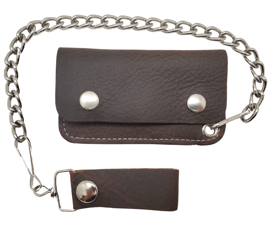The Kickstand is for the Minimalist. The most compact chain wallet we offer. Just enough room for some folded up cash a couple cards. Nothing to bog you down. Made in USA!

Choose Natural Veg-tan, Oil Tan Brown or Black
2 pockets
Complete with 12" chain
Approximate size 4.5" x 2.75"
Snap Closure
Real Leather