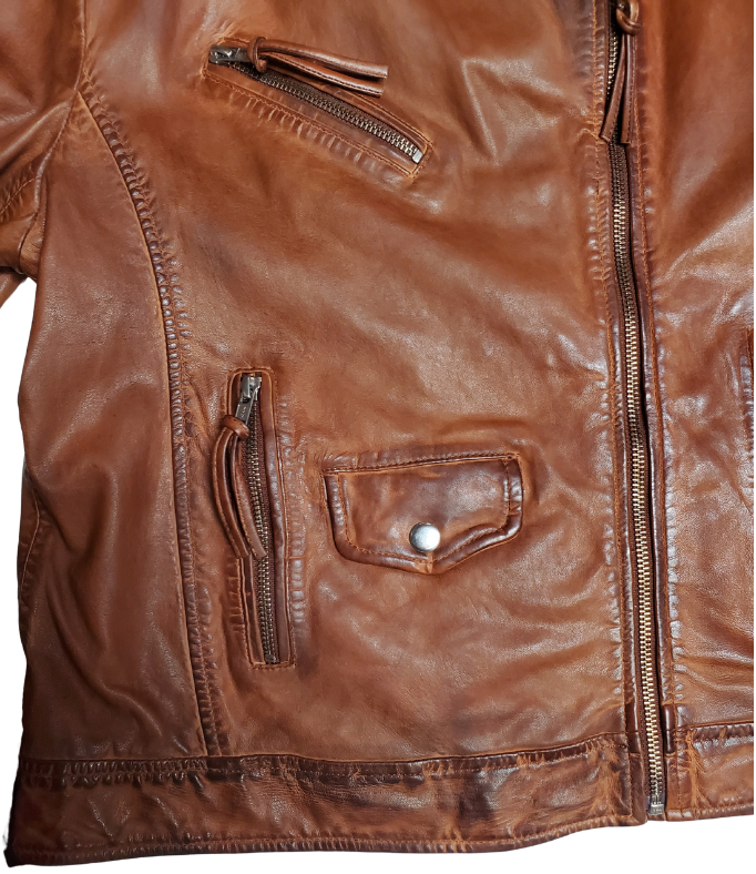 A Timeless Classic leather Modern moto Jacket in Vintage brown by Scully. Expertly tailored from Super soft, high quality leather. The sleek silhouette is slightly fitted at the waist to flatter. Your shape, while shoulder epaulettes and polished hardware add a classic motto finish. Get yours at our Smyrna, TN shop not far from crazy downtown Nashville.

Effortless attitude to any outfit.
Asymmetrical front zip closure, notch lapels with. Snap buttons
Multiple zippered and flap pockets