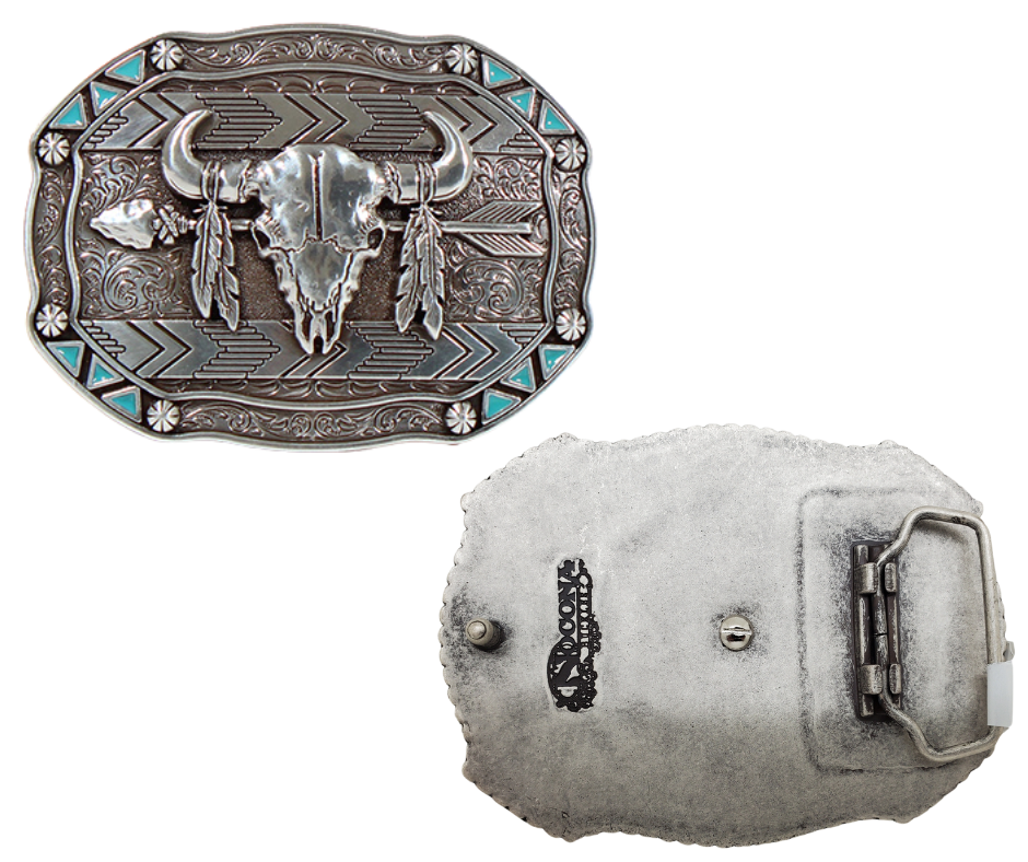 This belt buckle takes inspiration from the Lakota people, known for their buffalo hunting practices. It features an oval shape with small turquoise triangles and berry shapes along the border. In antique silver, it showcases a buffalo skull, feathers, and an arrow in the center. Measuring approximately 3" tall by 4" wide, it can fit belts up to 1 1/2" wide. You can find it in our retail shop in Smyrna, TN, near Nashville, or on our online store.