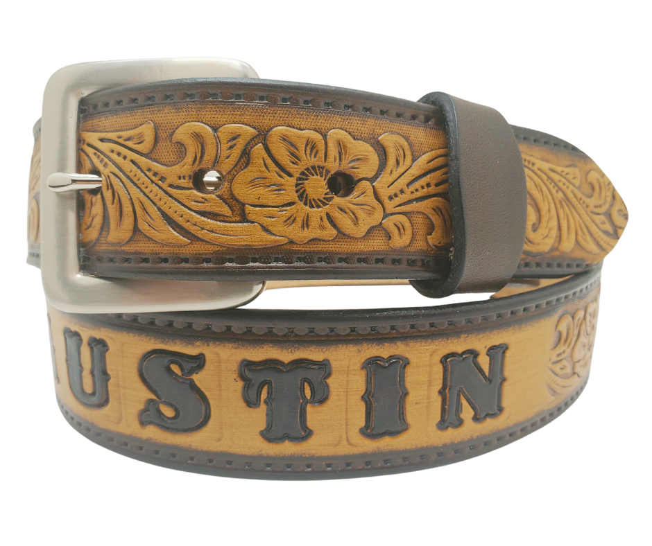 Unleash your western inner self with The "Lariat" Name Belt. Each belt features a unique hand-stained strip of vegetable tanned leather, adorned with a bold and timeless Western Floral pattern. The antique nickel finish solid brass buckle can be effortlessly swapped out. Crafted by hand at our Smyrna, Tennessee shop, just a stone's throw away from Nashville.