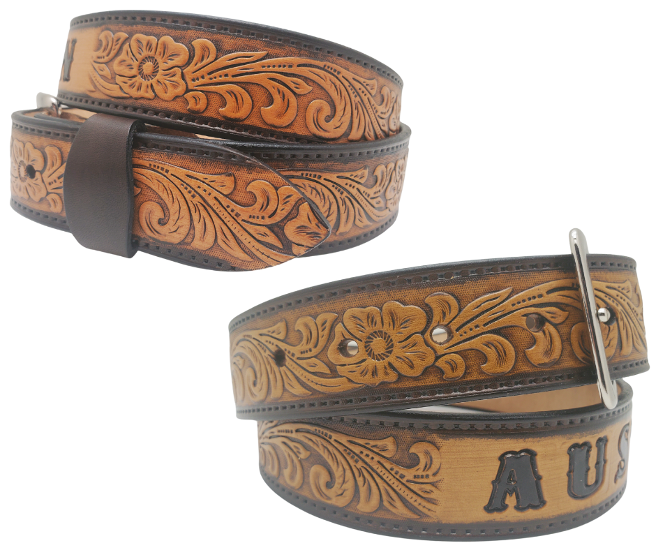 Unleash your western inner self with The "Lariat" Name Belt. Each belt features a unique hand-stained strip of vegetable tanned leather, adorned with a bold and timeless Western Floral pattern. The antique nickel finish solid brass buckle can be effortlessly swapped out. Crafted by hand at our Smyrna, Tennessee shop, just a stone's throw away from Nashville.