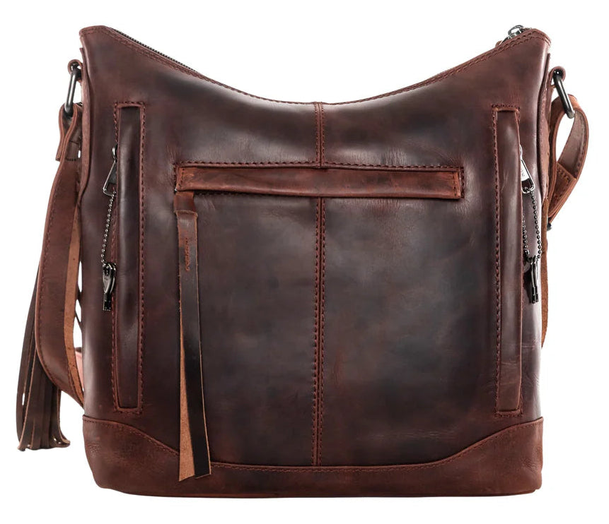 The Blake Scooped Leather Crossbody is crafted from premium full-grain leather, each piece showcasing its own natural variations in grain and shading. Intricate leather crisscross stitching adorns the front and sides, complemented by decorative long tassels for added charm. A large open pocket for your cell phone, and a leather key strap. A zippered pocket on the back adds more room for your essentials. Part of our Carry Conceal Handbags in our Smyrna, TN shop.