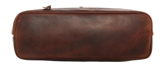 The Blake Scooped Leather Crossbody is crafted from premium full-grain leather, each piece showcasing its own natural variations in grain and shading. Intricate leather crisscross stitching adorns the front and sides, complemented by decorative long tassels for added charm. A large open pocket for your cell phone, and a leather key strap. A zippered pocket on the back adds more room for your essentials. Part of our Carry Conceal Handbags in our Smyrna, TN shop.