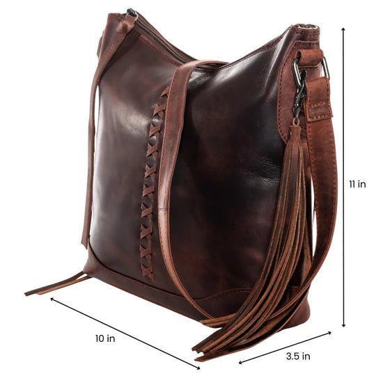 The Blake Scooped Leather Crossbody is crafted from premium full-grain leather, each piece showcasing its own natural variations in grain and shading. Intricate leather crisscross stitching adorns the front and sides, complemented by decorative long tassels for added charm. A large open pocket for your cell phone, and a leather key strap. A zippered pocket on the back adds more room for your essentials. Part of our Carry Conceal Handbags in our Smyrna, TN shop.