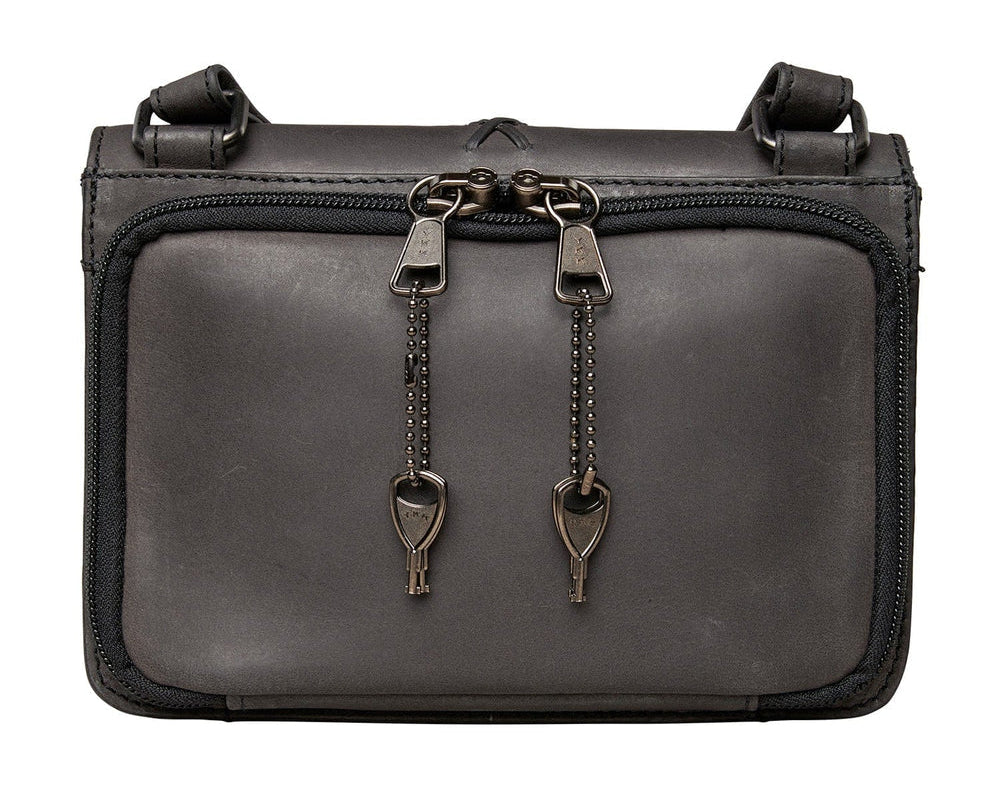 The Jolene, crafted with premium buffalo leather, has a flap that is highlighted with stunning criss-cross lacing. Underneath the front flap, secured with strong snaps, is an organizer with an ID holder, 3 credit card slots, an open pocket for a cell phone, and two zippered coin pockets with RFID protection. The main interior has two open compartments divided by a zippered pocket with an additional zippered pocket on the back of the interior. The adjustable crossbody strap measures 29”- 54” by .75 wide 