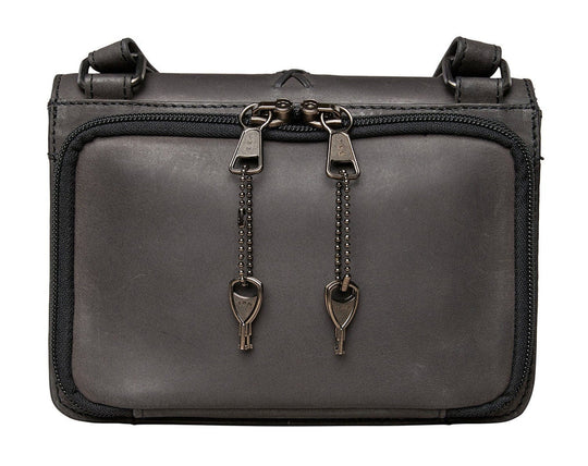 The Jolene, crafted with premium buffalo leather, has a flap that is highlighted with stunning criss-cross lacing. Underneath the front flap, secured with strong snaps, is an organizer with an ID holder, 3 credit card slots, an open pocket for a cell phone, and two zippered coin pockets with RFID protection. The main interior has two open compartments divided by a zippered pocket with an additional zippered pocket on the back of the interior. The adjustable crossbody strap measures 29”- 54” by .75 wide 