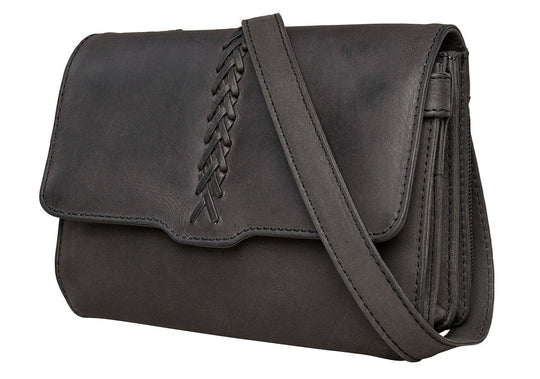 The Jolene, crafted with premium buffalo leather, has a flap that is highlighted with stunning criss-cross lacing. Underneath the front flap, secured with strong snaps, is an organizer with an ID holder, 3 credit card slots, an open pocket for a cell phone, and two zippered coin pockets with RFID protection. The main interior has two open compartments divided by a zippered pocket with an additional zippered pocket on the back of the interior. The adjustable crossbody strap measures 29”- 54” by .75 wide 