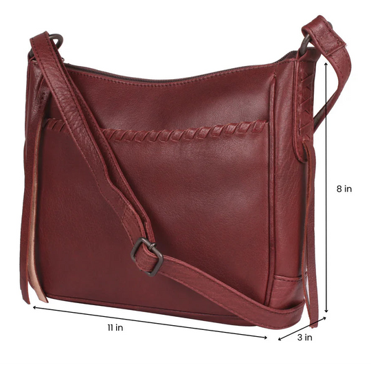 The Callie Leather Crossbody is crafted with quality full-grain leather, featuring stylish lacing on the front pocket and ends. The interior features a zippered pocket, 2 open slip pockets, another large open pocket, and a key strap for fast access to your keys. An additional zippered pocket on the back adds more room for your cell phone or other essentials. The ideal size for the lady on the go. Part of our Cary Conceal Handbags at our Smyrna, TN shop.