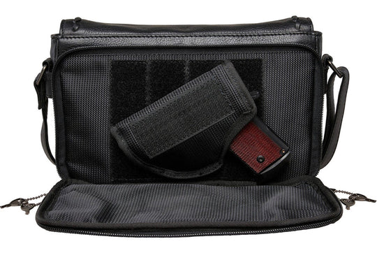 The Parker leather crossbody is constructed with soft leather. Stylish stitching highlights the front. This midsize crossbody is the ideal size for the lady on the go. The interior features an organizer with 4 credit card slots and 2 pen sleeves, a zippered pocket, and a leather key strap. The adjustable 3/4 “shoulder strap measures 30” -56” L x with a 12” - 26” drop. Get this at our Smyrna, TN shop not far from Murfreesboro.

Purse Dimensions: 10” L x 6.5 H x 3 D