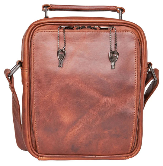 The Logan unisex crossbody is constructed with rich, full-grain leather. This bag is compact yet has plenty of storage space for your all necessities. The front compartment features an RFID-protected organizer with 4 credit card slots, 2 pen sleeves, and a zippered pocket on the front. The interior features a zippered pocket, a key strap, and 3 elastic magazine slots. Part of our Carry Conceal Handbags at our Smyrna, TN shop.