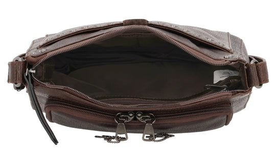 The Leah Crossbody is crafted with buffalo leather and has a light sprinkling of gunmetal studs. The front pocket is secured with a snap closure, contains a slim wallet. This RFID-protected wallet features 2 ID holders, 10 credit card slots, 2 open slit pockets for bills, and a full-size zippered pocket, ensuring your essentials are both organized and secure. The main interior is divided into two sections by a full-length zippered pocket. The front compartment offers two open slip pockets, while the back po