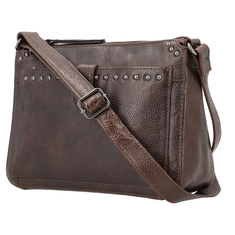 The Leah Crossbody is crafted with buffalo leather and has a light sprinkling of gunmetal studs. The front pocket is secured with a snap closure, contains a slim wallet. This RFID-protected wallet features 2 ID holders, 10 credit card slots, 2 open slit pockets for bills, and a full-size zippered pocket, ensuring your essentials are both organized and secure. The main interior is divided into two sections by a full-length zippered pocket. The front compartment offers two open slip pockets, while the back po