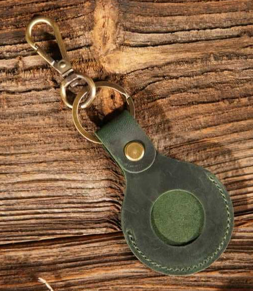 Always  know where you items are with this durable Leather Air Tag holder. Leather Air Tag Keychain Case with hook made from Real Leather. Part of our leather Tech accessories. Pick yours up at our Smyrna, TN shop not far the Nashville Apple store.

Choose from Red, Green, Blue, or Brown