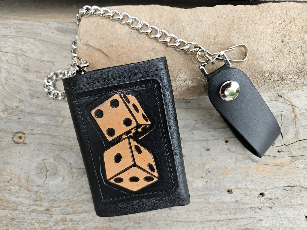Take a chance and Roll the Dice with our all leather Tri-fold Chain Wallet. 1 Cash Slot for all your important stash, 3 card slots and 1 underneath the middle slot. It&