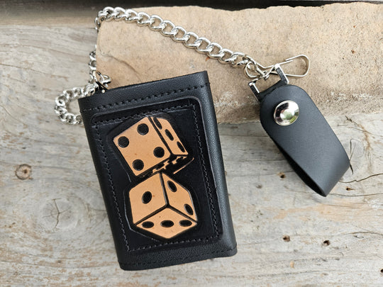 Take a chance and Roll the Dice with our all leather Tri-fold Chain Wallet. 1 Cash Slot for all your important stash, 3 card slots and 1 underneath the middle slot. It&