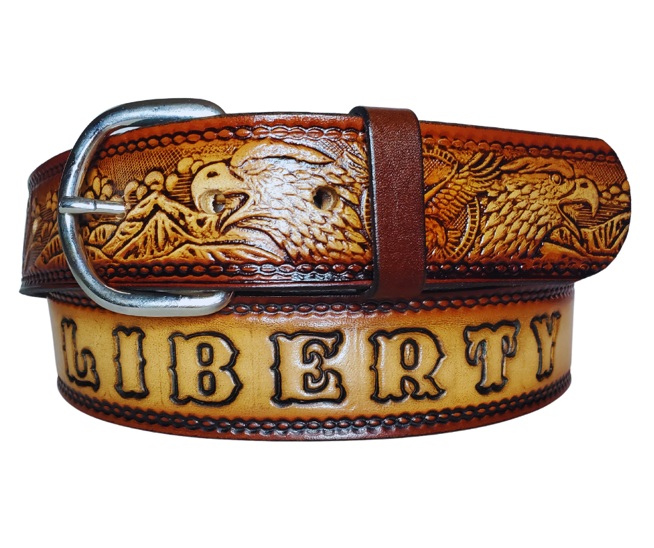 This All American Eagle leather belt features Wild Eagles in an antiqued Brown finish with a 1 1/2" width. It is crafted from full grain veg-tanned cowhide, with smooth burnished painted edges and a nickel-plated buckle. For customizing, simply type your desired name or No Name in the "Type Name Here" section,  the buckle can be easily interchanged as well. This product is in stock at our Smyrna, TN shop