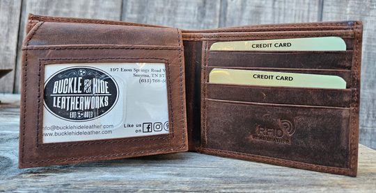 With a name like Lincoln this has to be a practical Bi-fold leather wallet. Equipped with 10 credit card slots and 2 ID window slots on a flip-up extension piece. The main compartments has a cash divider. Lined with RFID blocking. . Available in our Smyrna, TN shop near Sewarts Landing.

Made in India.
Approx. 4 1/4”x 3 3/4" when closed