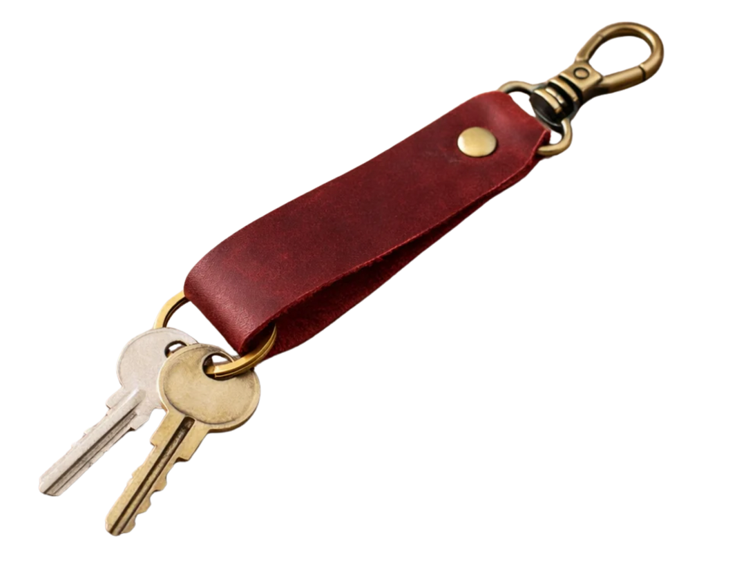 Keep your keys organized in style with the Loop genuine leather keychain. Made from high-quality Crazy Horse solid leather construction is reinforced with a secure metal button joint, ensuring strength you can rely on every day. Over time, the leather develops a beautiful patina, making each piece truly one of a kind. Now available at our Smyrna, TN shop not far from Franklin.

Dimensions: 6 × 0.85 inches