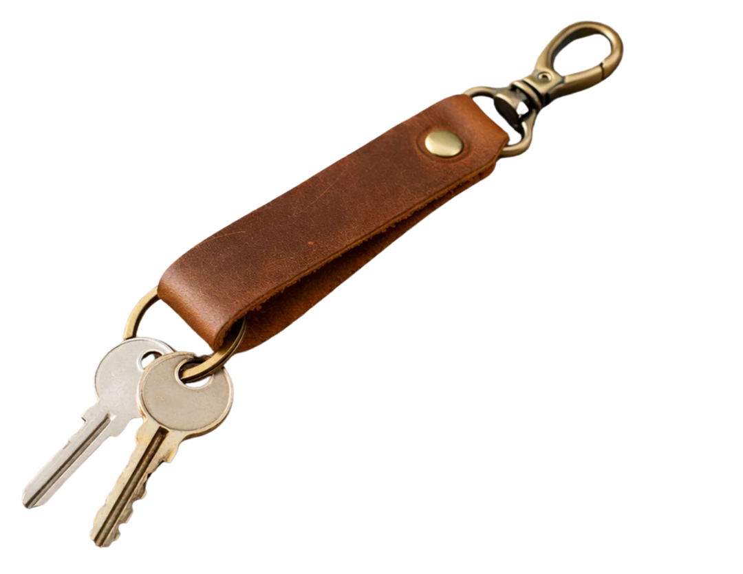 Keep your keys organized in style with the Loop genuine leather keychain. Made from high-quality Crazy Horse solid leather construction is reinforced with a secure metal button joint, ensuring strength you can rely on every day. Over time, the leather develops a beautiful patina, making each piece truly one of a kind. Now available at our Smyrna, TN shop not far from Franklin.

Dimensions: 6 × 0.85 inches