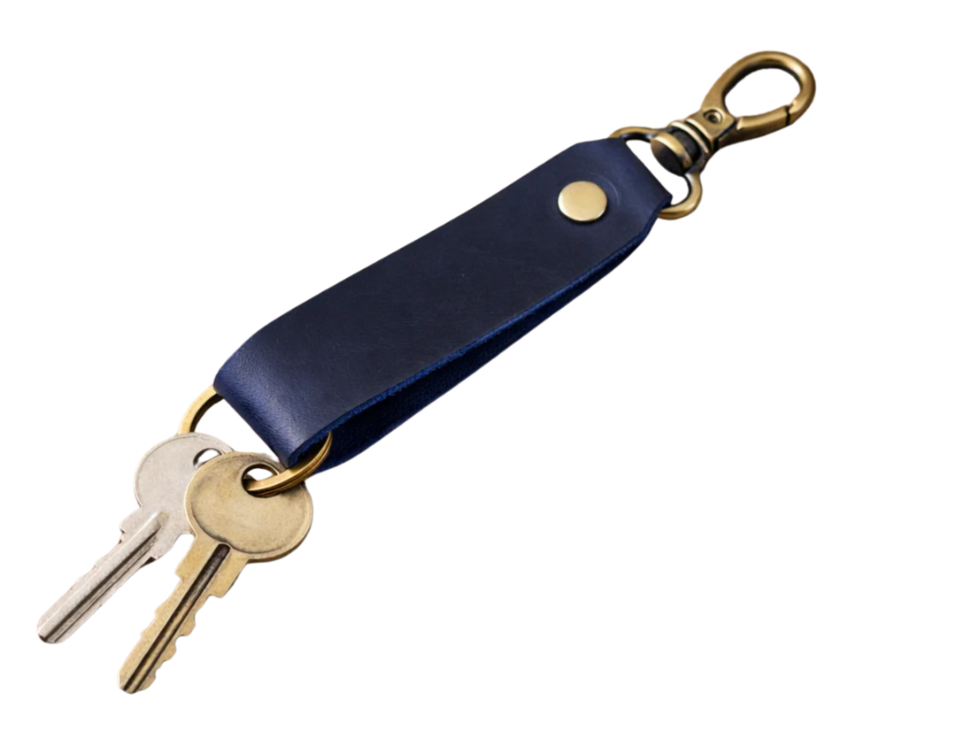 Keep your keys organized in style with the Loop genuine leather keychain. Made from high-quality Crazy Horse solid leather construction is reinforced with a secure metal button joint, ensuring strength you can rely on every day. Over time, the leather develops a beautiful patina, making each piece truly one of a kind. Now available at our Smyrna, TN shop not far from Franklin.

Dimensions: 6 × 0.85 inches