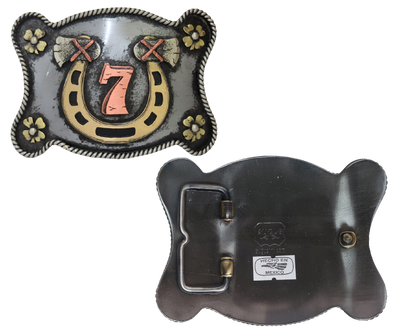 The Lucky 7 buckle is made from German Silver (nickel and brass alloy) or iron metal base. Each piece is punched, cut, soldered, engraved, polished and painted by our talented metal workers.  Our products are all handcrafted. Finally each piece is covered with a heat sealed lacquer to ensure the piece's long lasting qualities. Available at our Smyrna, TN shop just outside of Nashville.