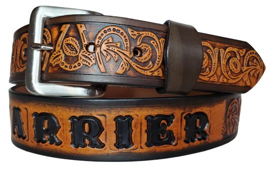 We are always trying to find classic iconic patterns and this is one of those....Horseshoes mixed with a Western scroll pattern. It's a professionally crafted, genuine leather belt made from 8-10 oz cowhide shoulder leather, approximately 1/8" thick. It boasts a hand burnished edge, along with a multi-step dye and finishing technique. The antique nickel plated solid brass buckle is affixed with heavy snaps. This belt is crafted near Nashville, TN in Smyrna.