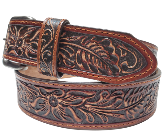 Experience the essence of the Old West with this 1 1/2" leather belt, featuring Edge stitching and a classic Western pattern. Its slightly distressed deep mahogany brown leather adds a touch of rustic charm to any outfit. Visit our Smyrna, TN shop, just a quick rideshare away from the bustling Wild West vibe of downtown Nashville.