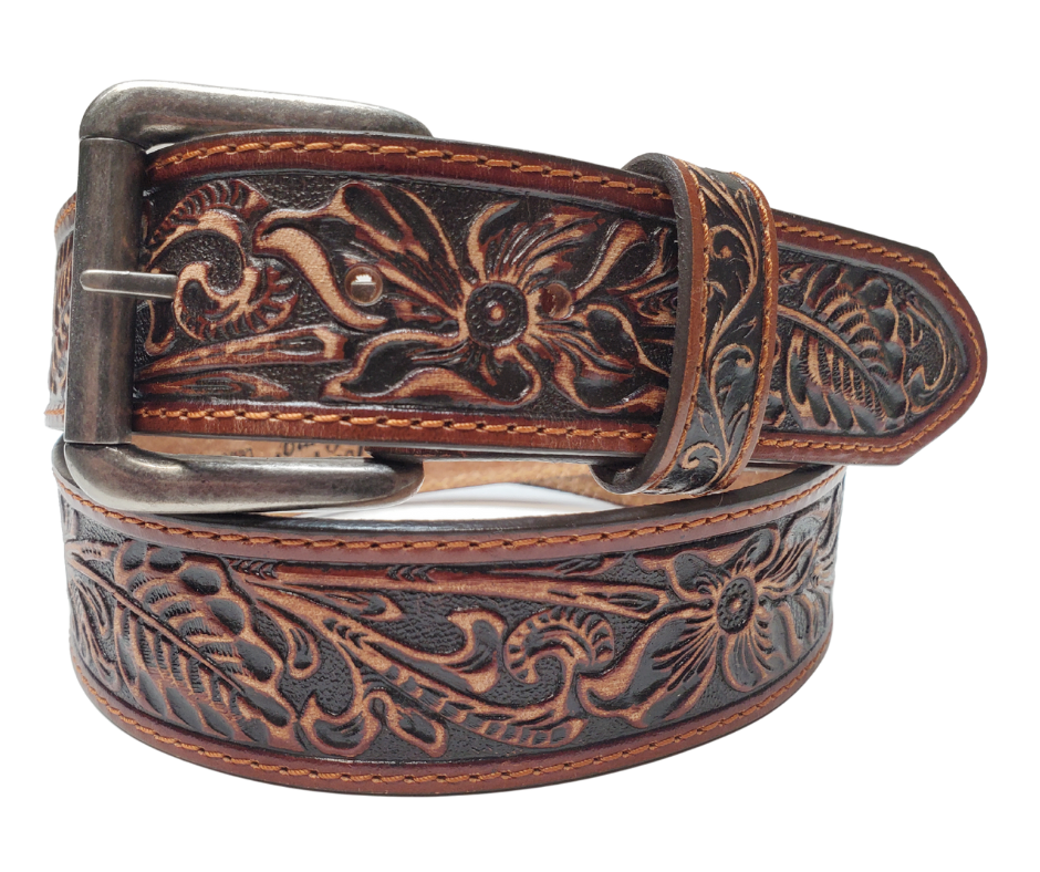 Experience the essence of the Old West with this 1 1/2" leather belt, featuring Edge stitching and a classic Western pattern. Its slightly distressed deep mahogany brown leather adds a touch of rustic charm to any outfit. Visit our Smyrna, TN shop, just a quick rideshare away from the bustling Wild West vibe of downtown Nashville.