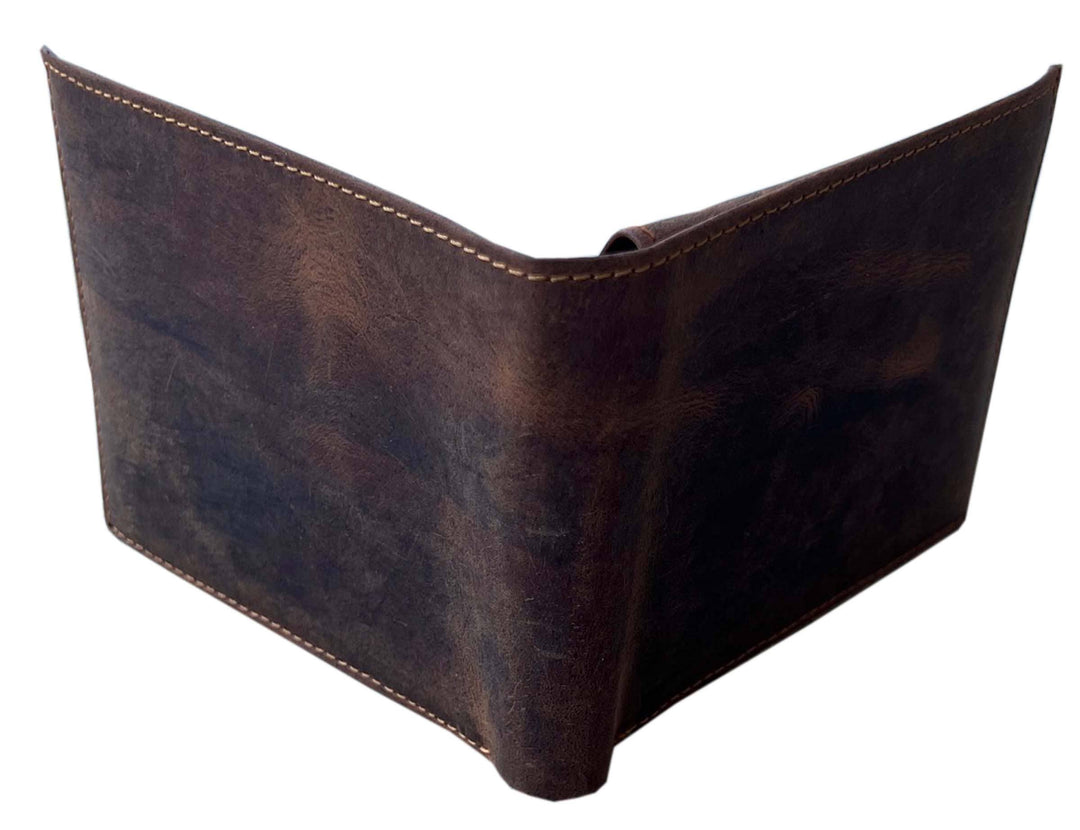 With a name like Lincoln this has to be a practical Bi-fold leather wallet. Equipped with 10 credit card slots and 2 ID window slots on a flip-up extension piece. The main compartments has a cash divider. Lined with RFID blocking. . Available in our Smyrna, TN shop near Sewarts Landing.

Made in India.
Approx. 4 1/4”x 3 3/4" when closed