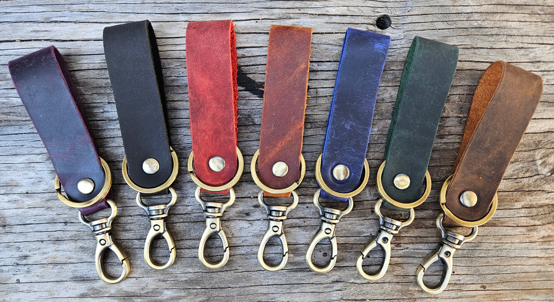 Keep your keys organized in style with the Loop genuine leather keychain. Made from high-quality Crazy Horse solid leather construction is reinforced with a secure metal button joint, ensuring strength you can rely on every day. Over time, the leather develops a beautiful patina, making each piece truly one of a kind. Now available at our Smyrna, TN shop not far from Franklin.

Dimensions: 6 × 0.85 inches