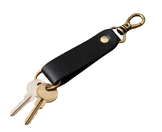 Keep your keys organized in style with the Loop genuine leather keychain. Made from high-quality Crazy Horse solid leather construction is reinforced with a secure metal button joint, ensuring strength you can rely on every day. Over time, the leather develops a beautiful patina, making each piece truly one of a kind. Now available at our Smyrna, TN shop not far from Franklin.

Dimensions: 6 × 0.85 inches