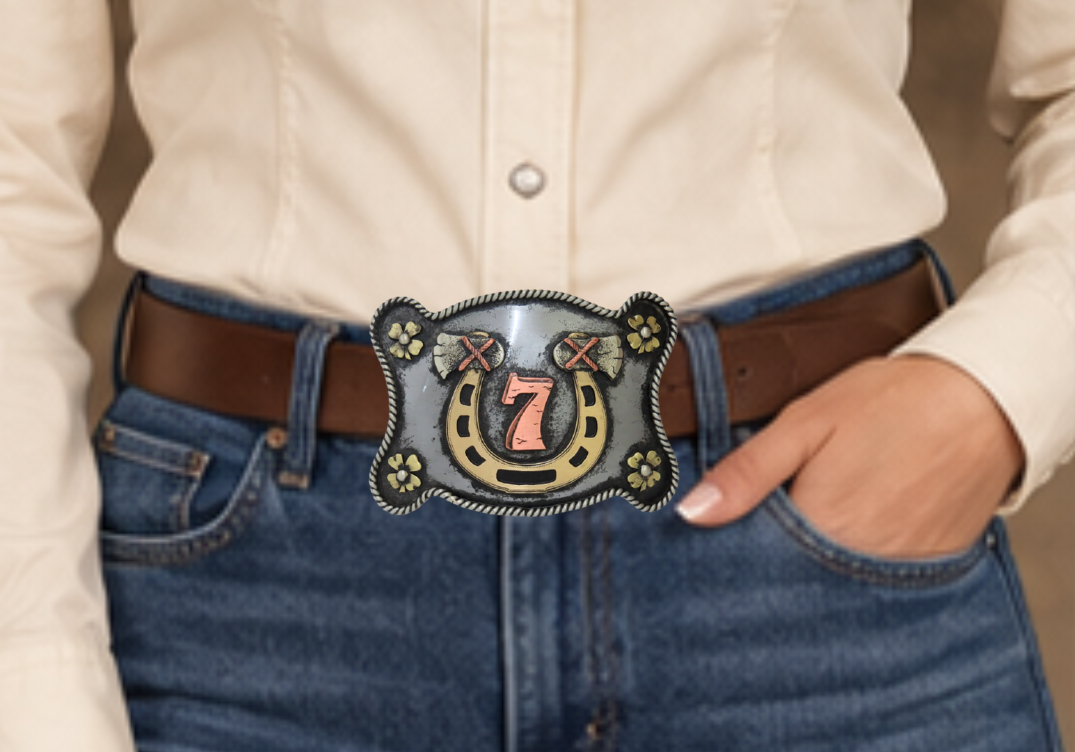 The Lucky 7 buckle is made from German Silver (nickel and brass alloy) or iron metal base. Each piece is punched, cut, soldered, engraved, polished and painted by our talented metal workers.  Our products are all handcrafted. Finally each piece is covered with a heat sealed lacquer to ensure the piece&