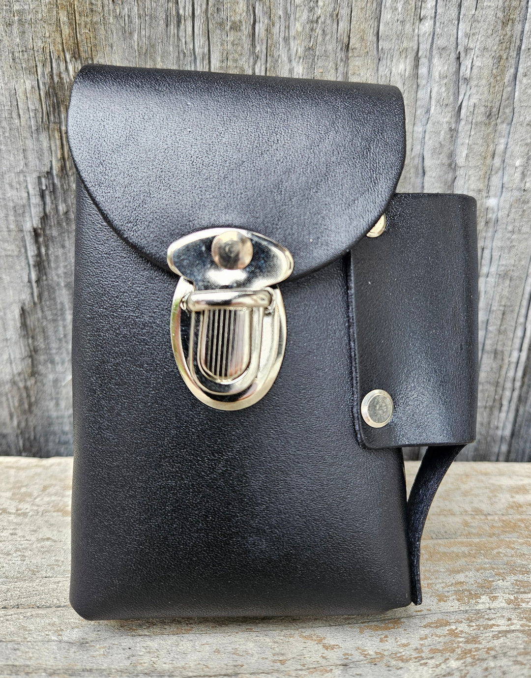 Carry your cigarettes in style with our Cigarette Case. Made in the USA with strong, riveted leather and a side pocket for a lighter. It also features a belt loop on the back so you can easily take it with you wherever you go. Available at our Smyrna, TN store conveniently located near Murfreesboro.